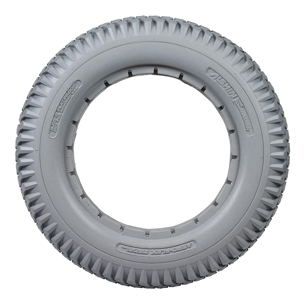 14x3 (3.00-8) Light Gray Solid Urethane Mobility Tire with Aero-flex™ Knobby Tread for Invacare Power Chairs; close-up view highlighting the tire's knobby tread pattern and solid structure.