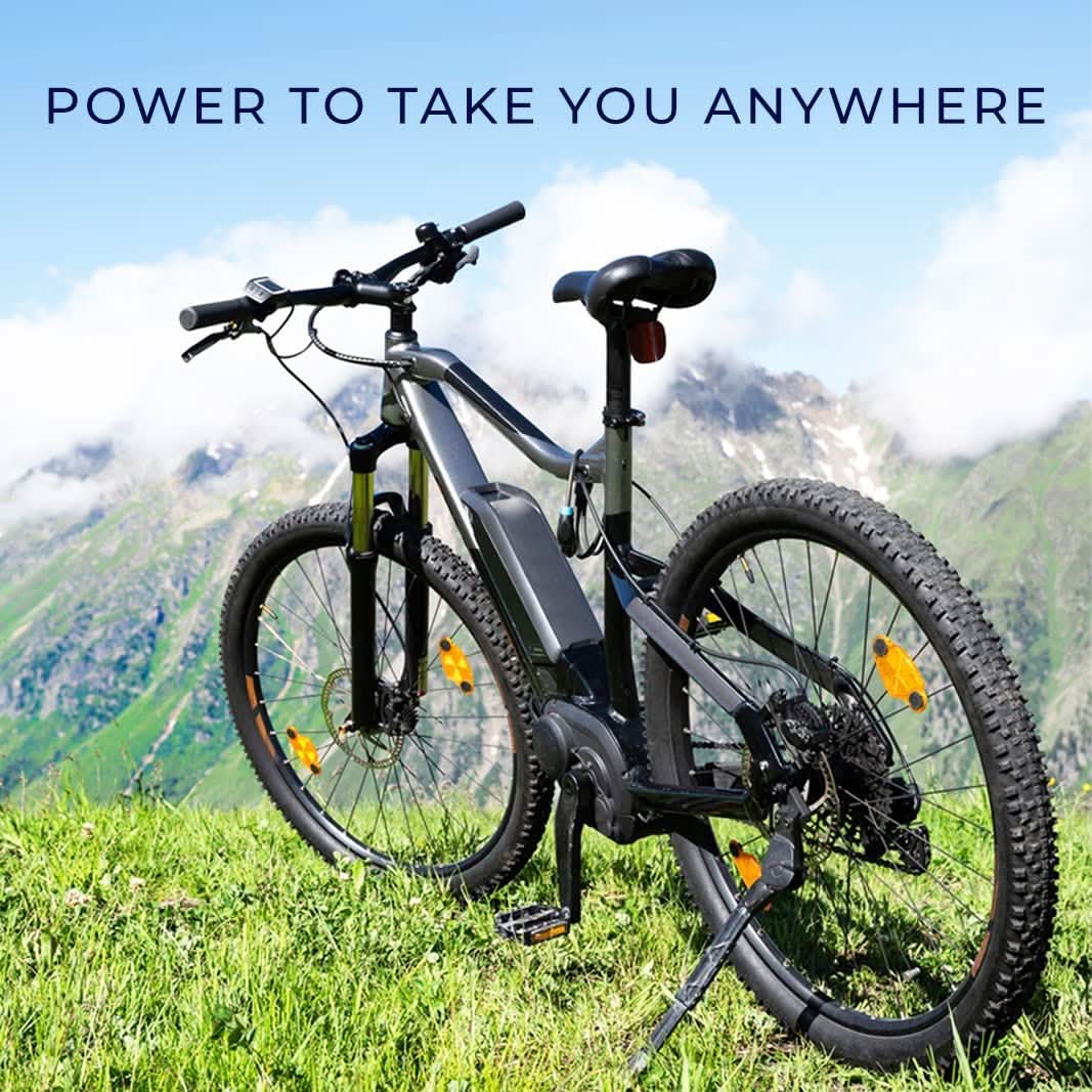 48 Volt 3.0 Amp 3-Pin Quick-Charge Battery Charger for AGM & Gel Batteries (Premium) on grassy hill, showcasing its inline style with visible cords, suitable for flexible charging.