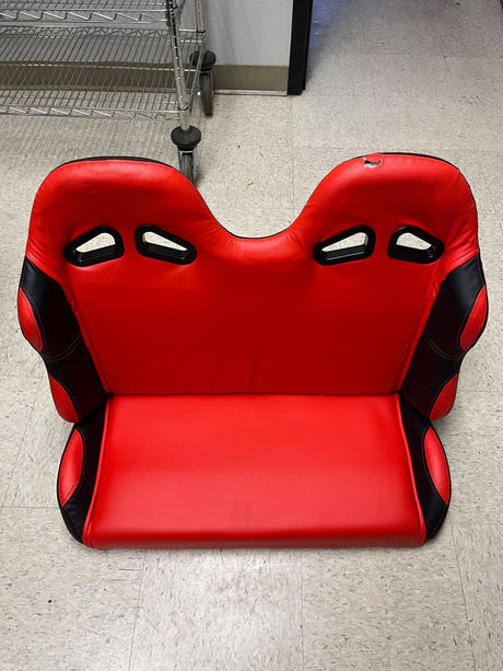 31-1/2 Red Double Seat for the Coleman KT196 Go-Kart (Blemished) featuring back vents for seatbelt placement.