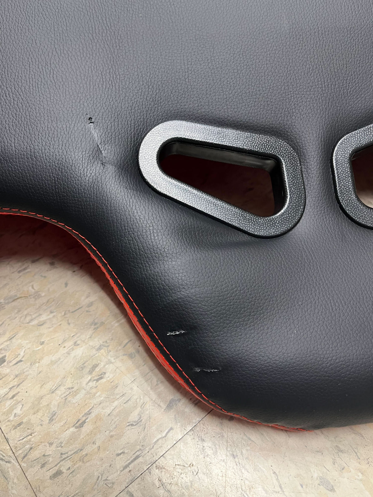 31-1/2 Red Double Seat for Coleman KT196 Go-Kart (Blemished) with black leather surface, red stitching, and back vents for seatbelt placement.