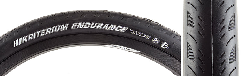 Close-up of the 20x1.25 Kriterium Enduro Sport Bicycle Tire, showcasing its grooved side tread and dual layer puncture protection, designed for durability and a comfortable ride.