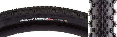 Close-up of the 700x32 Happy Medium Pro Bicycle Tire showcasing its fast-rolling center section and aggressive outer edges for cornering control, with visible center and corner knobs for seamless transitions.