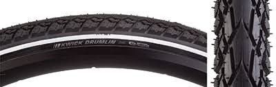 Close-up of 700x35 Reflective Kwick Drumlin Sport KS Bicycle Tire showcasing thick tread, square profile, deep siping, and burly shoulder lugs, optimized for pavement, gravel, and forest roads.