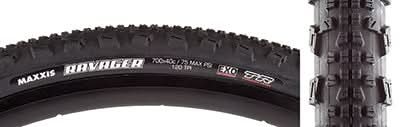 700x40 Ravager DC/EXO/TR Bicycle Tire close-up showcasing its raised square-edged center knobs and oversized cornering knobs, designed for optimal traction on trails with EXO sidewall protection and Tubeless Ready casing.
