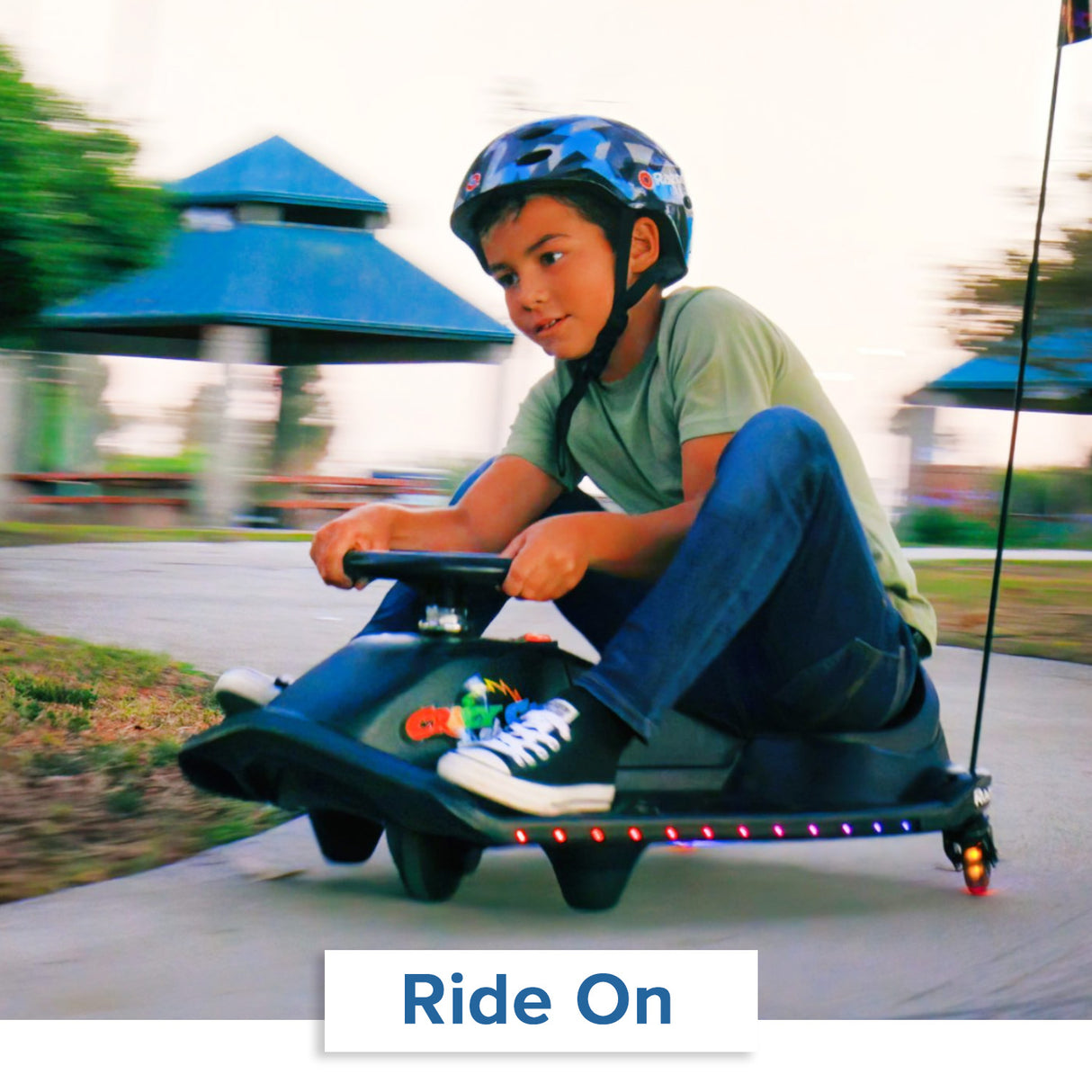 Child riding a Razor Crazy Cart Shift, highlighting the 24 Volt 2.3 Ah Battery Pack with 30 Amp Fuse & Wiring for Razor Crazy Cart Shift (Versions 1+) & Crazy Cart Shift Lightshow.