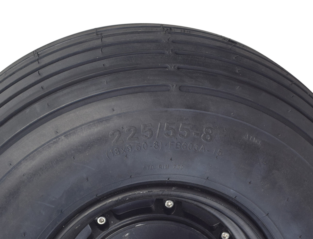 Close-up of the 60 Volt 1500 Watt Hub Motor & 18x9.50-8 Wheel Assembly for Fat Tire Scooters, showcasing the detailed tread pattern and the integrated hub motor with axle and wiring components.