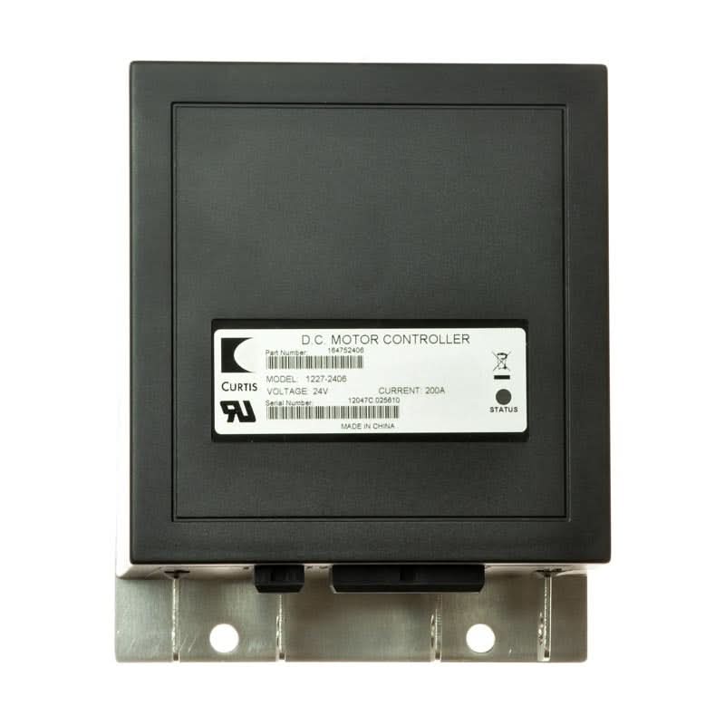 Controller for the Pride Wrangler PMV600/PMV620, a black rectangular electronic device with a visible white label, designed for high-quality mobility, made by Curtis, shown close-up.