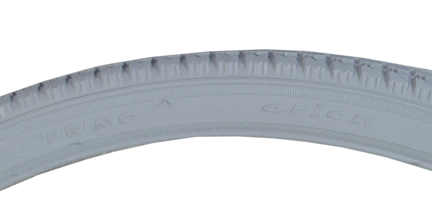 24x1-3/8 (37-540) Gray Pneumatic Wheelchair Tire with C63 Tread features a close-up of the non-marking gray tire, showcasing its detailed tread pattern designed for various wheelchairs.