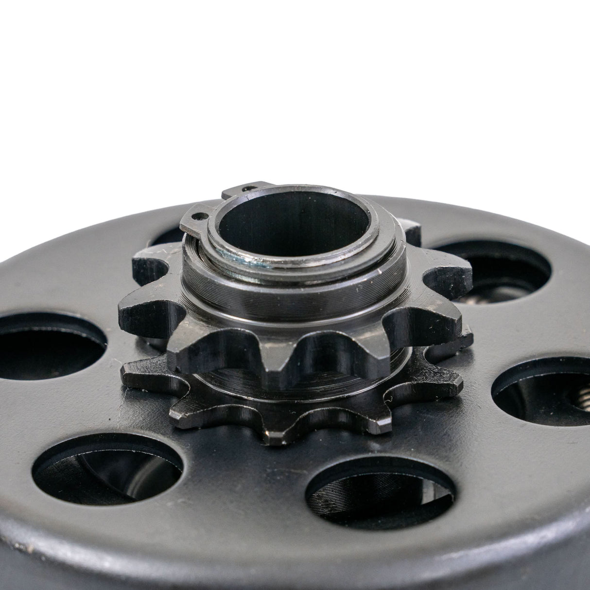 Close-up of a Clutch Assembly with 3/4 Shaft & 10 Tooth 420 Chain Sprocket for Baja Mini Bike MB165 & MB200, showing intricate black metal gear components.