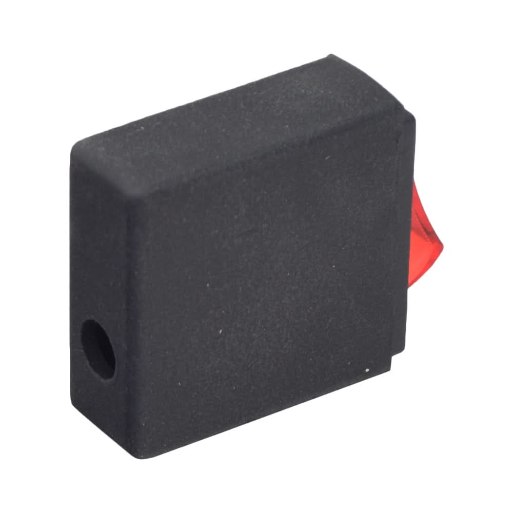 FWD/REV Switch for Minimoto Jeep Dune Buggy, showing a black rectangular object with a red light/button.
