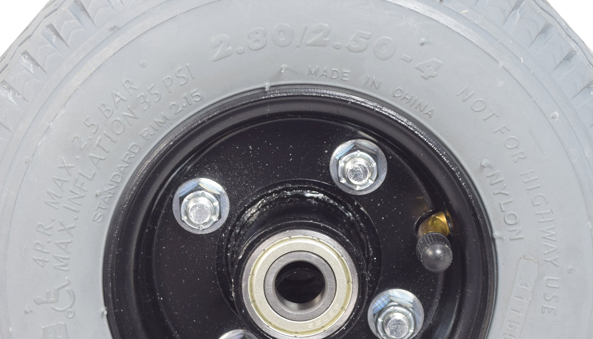 9 (220x75) Pneumatic Front Wheel Assembly for the Golden Companion II (GC340) featuring a close-up of the metal rim, bearings, and screws, showcasing the air-filled tire and tube assembly.
