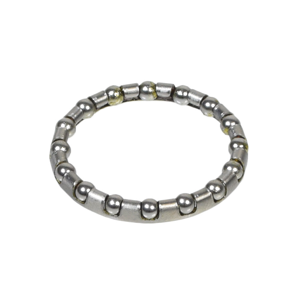 Head Tube Bearing for Golden Technologies Buzzaround and Companion Series: Close-up of a shiny metal ring with small ball bearings, essential for the tiller assembly's pivot function in the mobility scooter frame.