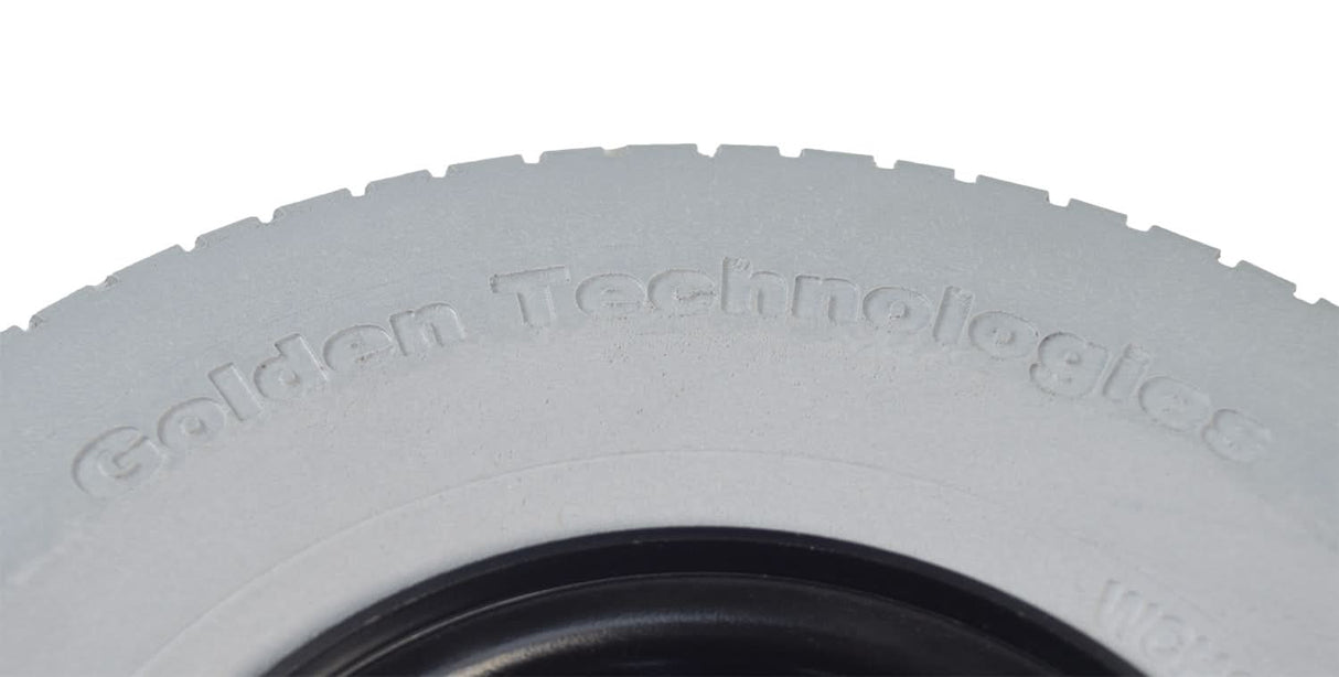 9 x 3.50-4 Foam-Filled Rear Wheel Assembly for the Golden Technologies Companion I, showcasing a close-up of the tire's detailed tread pattern and durable non-marking gray rubber.