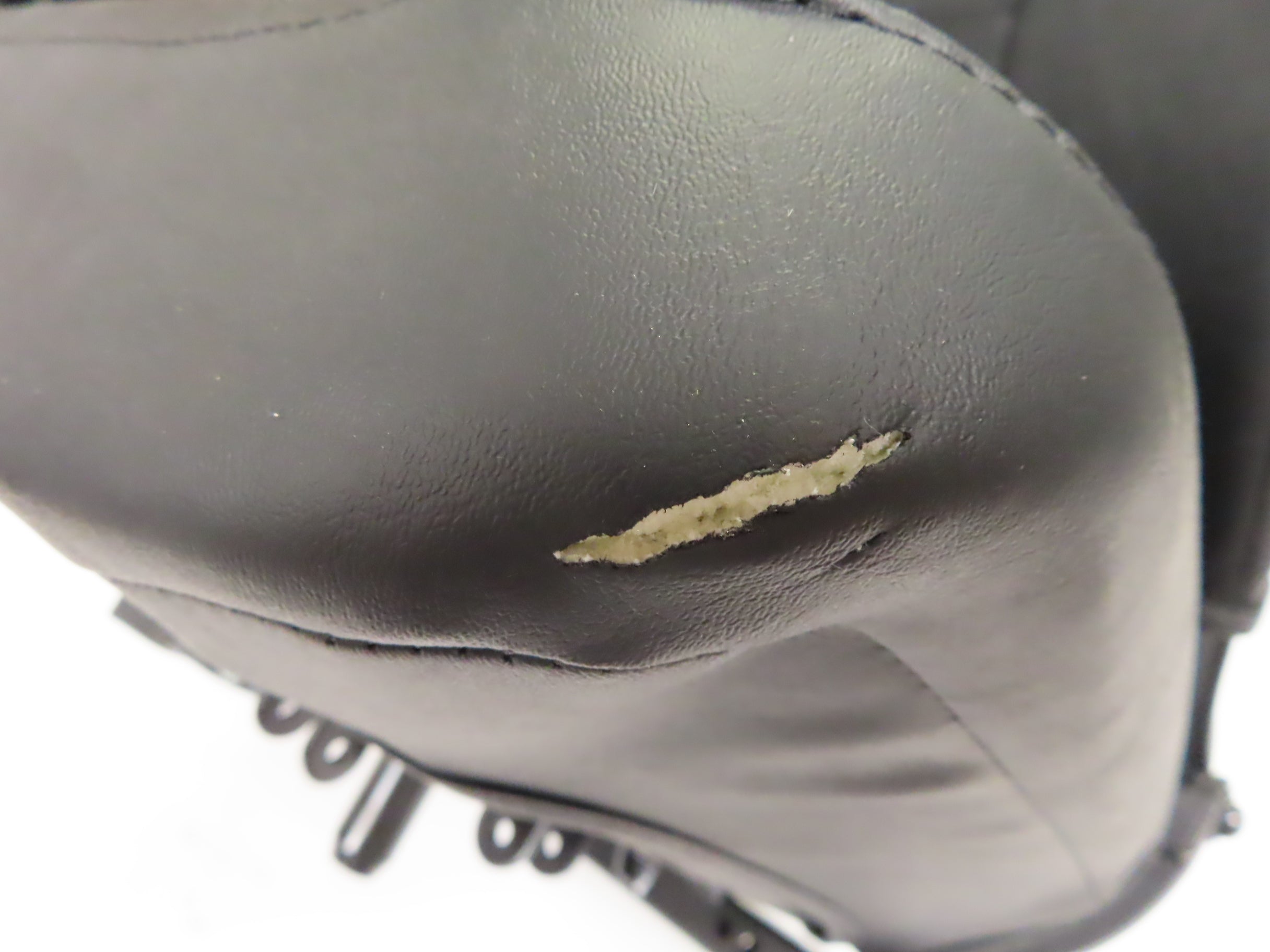 17 Wide Molded Seat Assembly for Go-Go and Pride Mobility Scooters (Blemished) showing a black leather seat with a 1 tear on the front base, including armrests and seat frame.