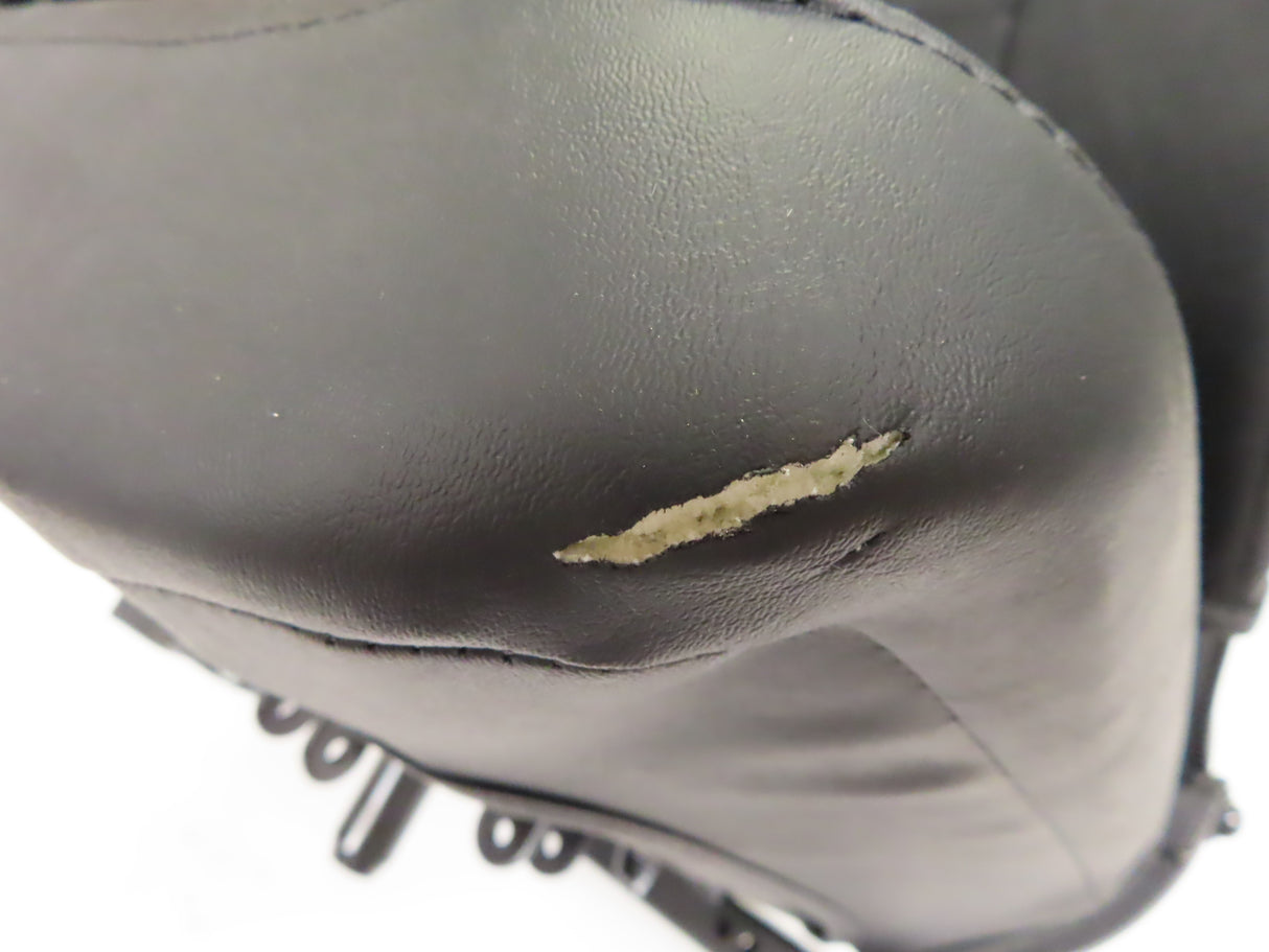 17 Wide Molded Seat Assembly for Go-Go and Pride Mobility Scooters (Blemished) showing a black leather seat with a 1 tear on the front base, including armrests and seat frame.