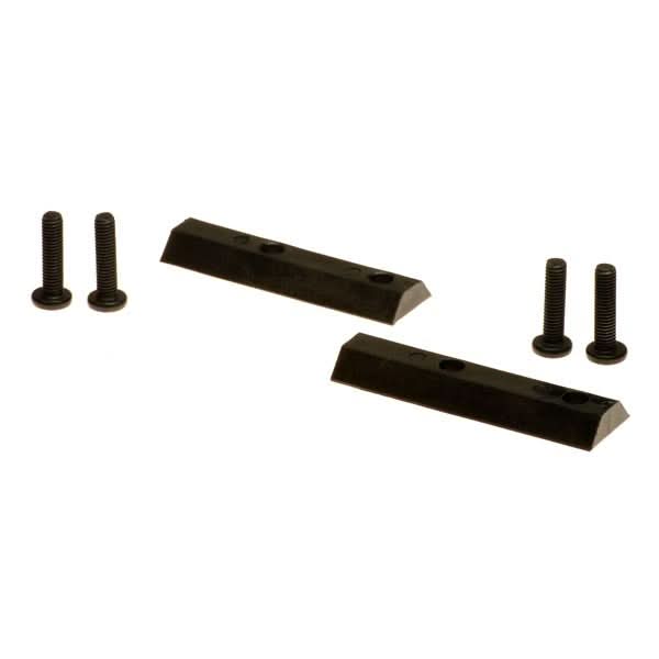 Inline Joystick Mounting Bracket for the Dynamic Shark Remote, featuring several black screws, black plastic pieces, and a black rectangular object with holes, compatible with Jazzy power chairs.