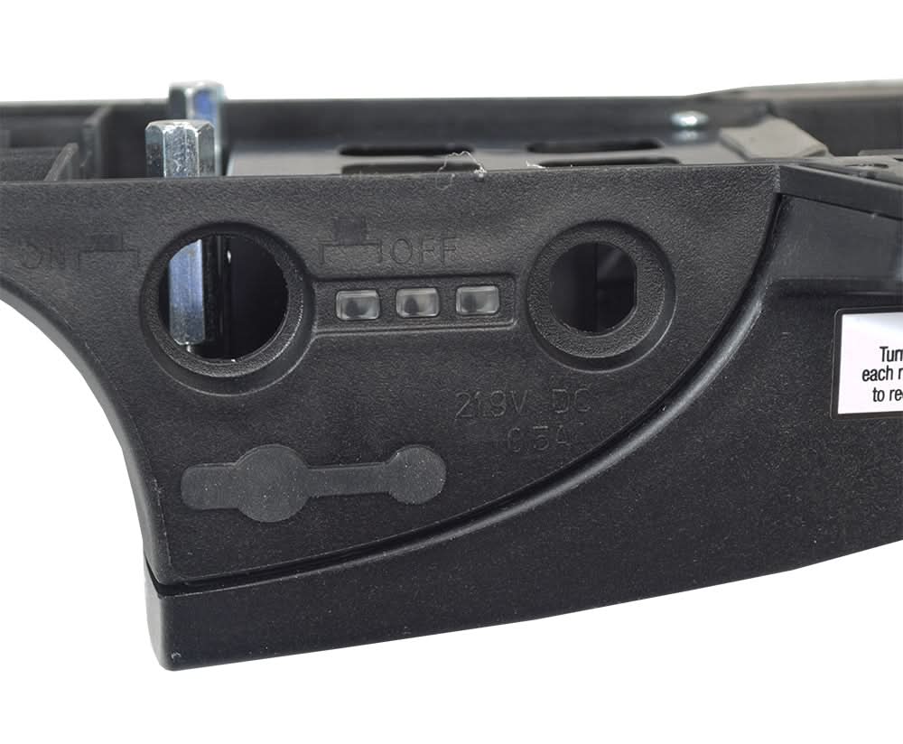 Battery & Electronics Tray for the RazorX Cruiser Electric Skateboard, a black plastic box with screws and holes, designed to hold the Lithium battery, motherboard, and ports, featuring an easy-access sliding cover.