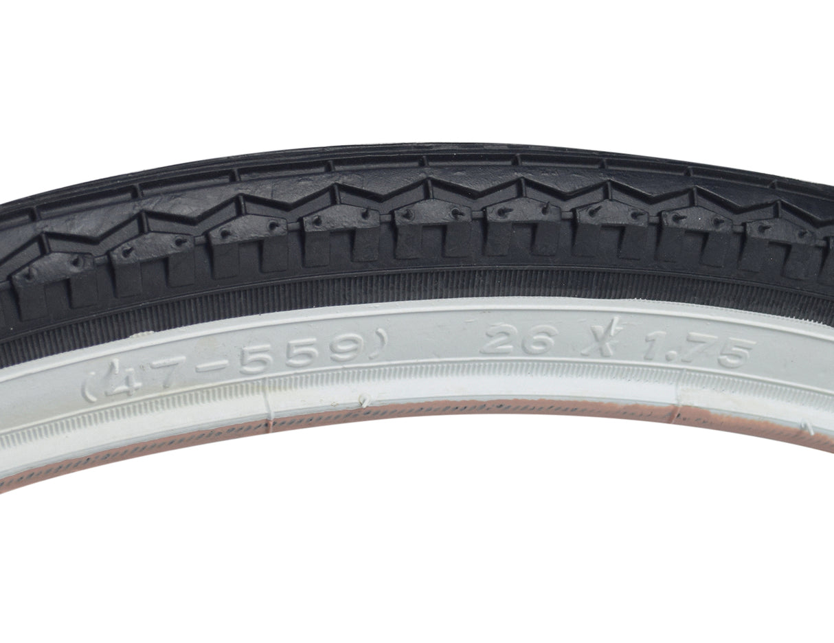 Close-up of the 26x1.75 White Wall Street Tire with K123 Tread, showing the tire's detailed tread pattern and two-tone side walls.
