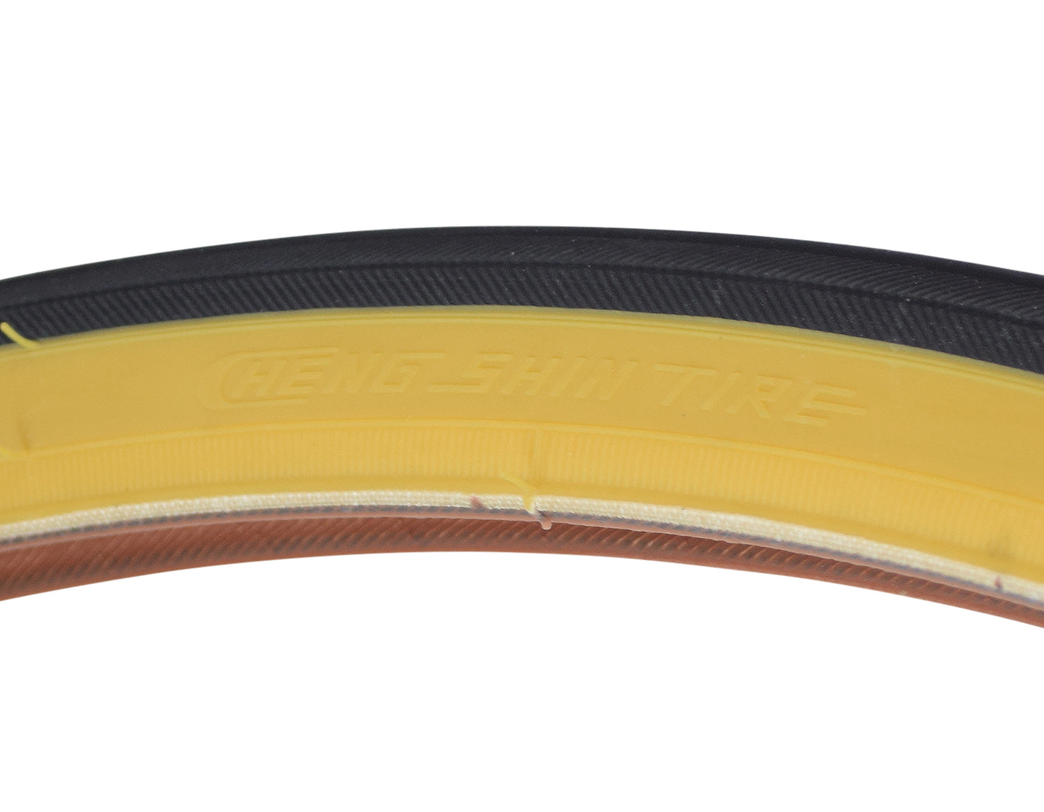Close-up of a 27x1-1/4 Road Raised Center CST638 Bicycle Tire, showcasing its detailed tread pattern and robust build, ideal for road cycling.