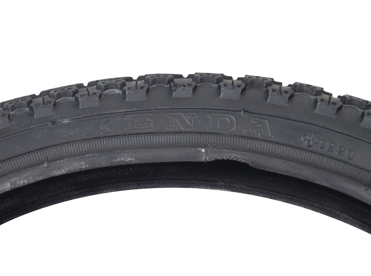 Close-up of the 16x1.75 MX3 Bicycle Tire from Sunlite, highlighting its detailed tread pattern and sturdy synthetic rubber material, ideal for replacing old bike tires.