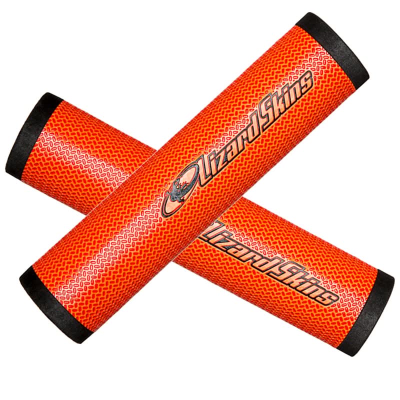 DSP 32.3 mm Grips for Bikes & Scooters featuring two orange sticks with black handles, designed with DuraSoft Polymer for superior comfort and lightweight performance, ideal for larger hands.