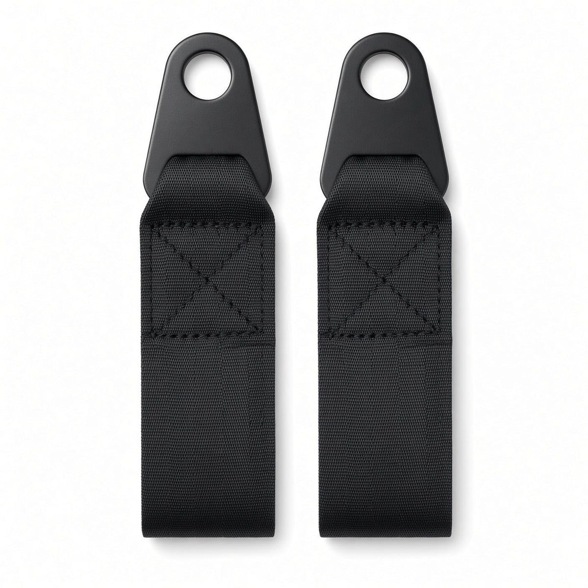 Two black steel eyelet mounting tabs with 5/8" hole and X-stitched webbing for bolting the seat belt to a power chair seat frame