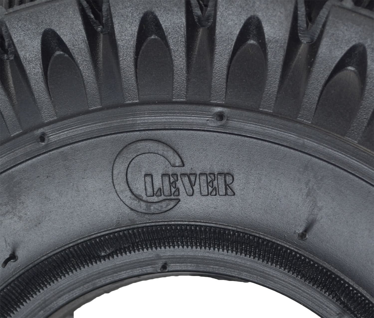 Close-up of a 10x3 (3.00-4, 260x85) Scooter, ATV, & Go Kart Tire with Q113 Knobby Tread, showing detailed tread pattern for enhanced off-road traction.