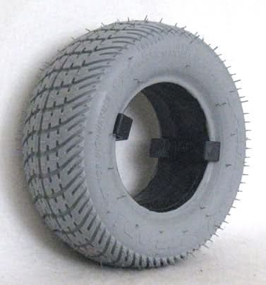 Rock N Roller 8x2-1/2 Solid Tire - close-up of a grey tire with black rim, showcasing the unique in-cut C9267 tread pattern designed for efficient rolling on hard surfaces.