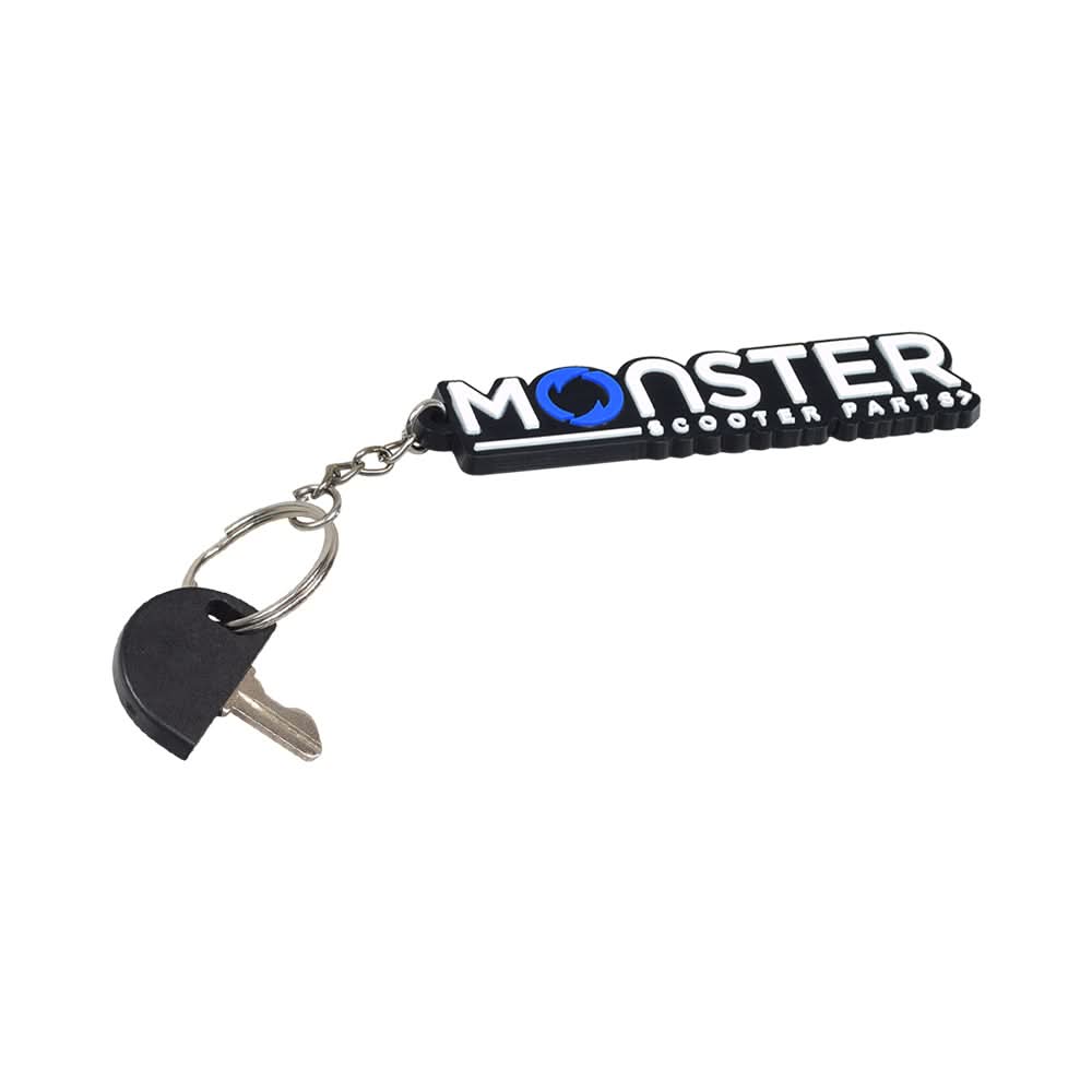 Key for the PaceSaver Passport Scooter shown with a black plastic shroud, designed to shield the key cylinder opening from elements. Ideal for older PaceSaver models made between 1989 and 1998.