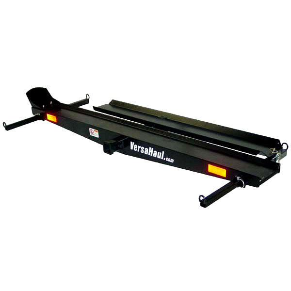 Sport Bike Carrier with Ramp from VersaHaul, featuring a black trailer hitch with red lights, designed for easy transport of sport bikes; includes a ramp and various tie-down bars for secure attachment.