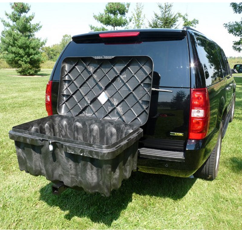 Storage Bin Carrier attached to the back of a black SUV, showcasing its durable plastic box and metal tube with powder coat finish, ideal for extra cargo space.