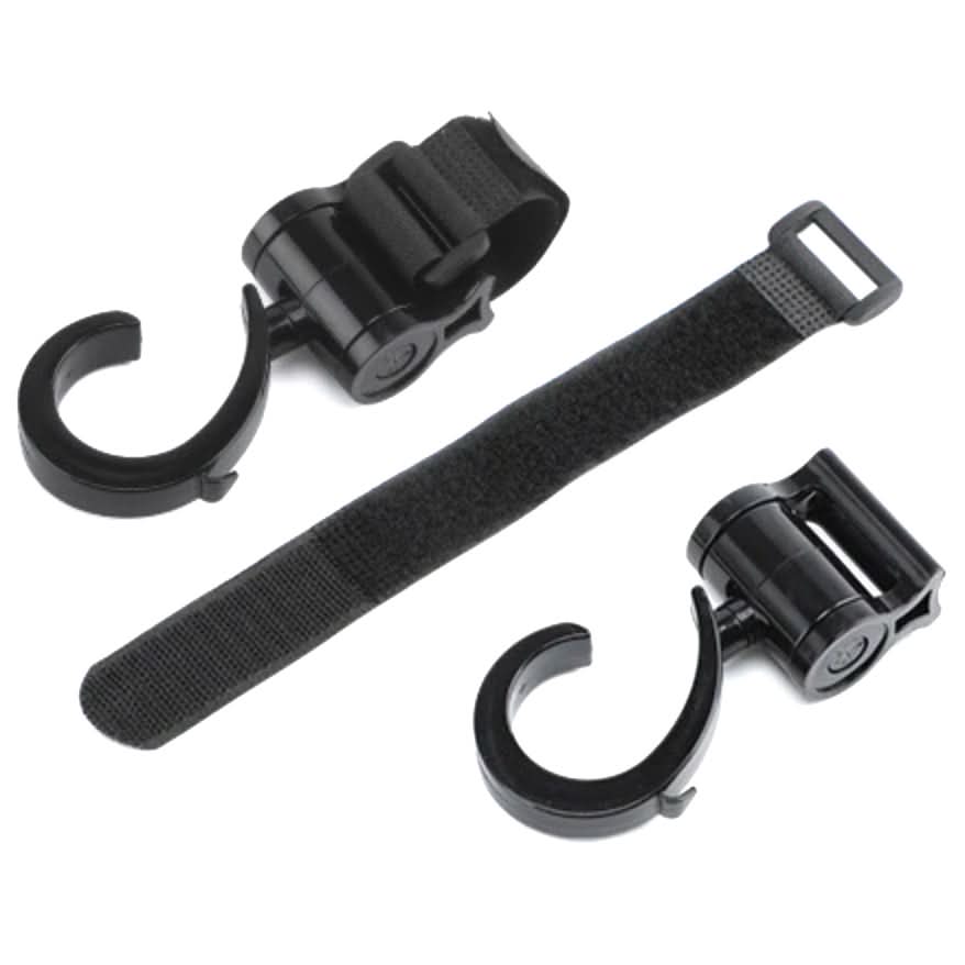 Two swivel hooks with a hook and loop mounting strap laid out between them