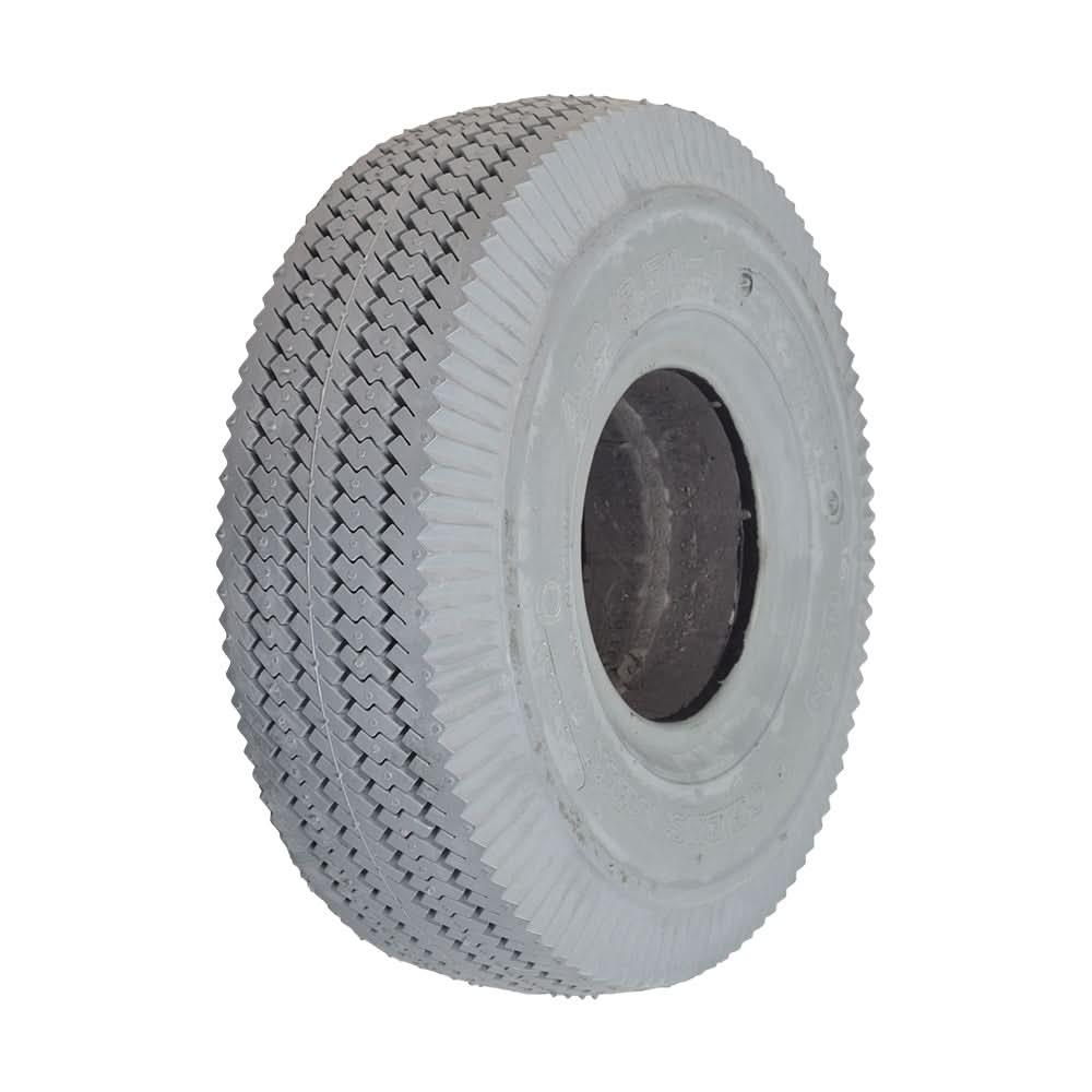 Close-up of the 4.10/3.50-4 Foam-Filled Mobility Tire with C189 Sawtooth Tread, showcasing its detailed synthetic rubber texture and central hole, designed for mobility scooters and power wheelchairs.