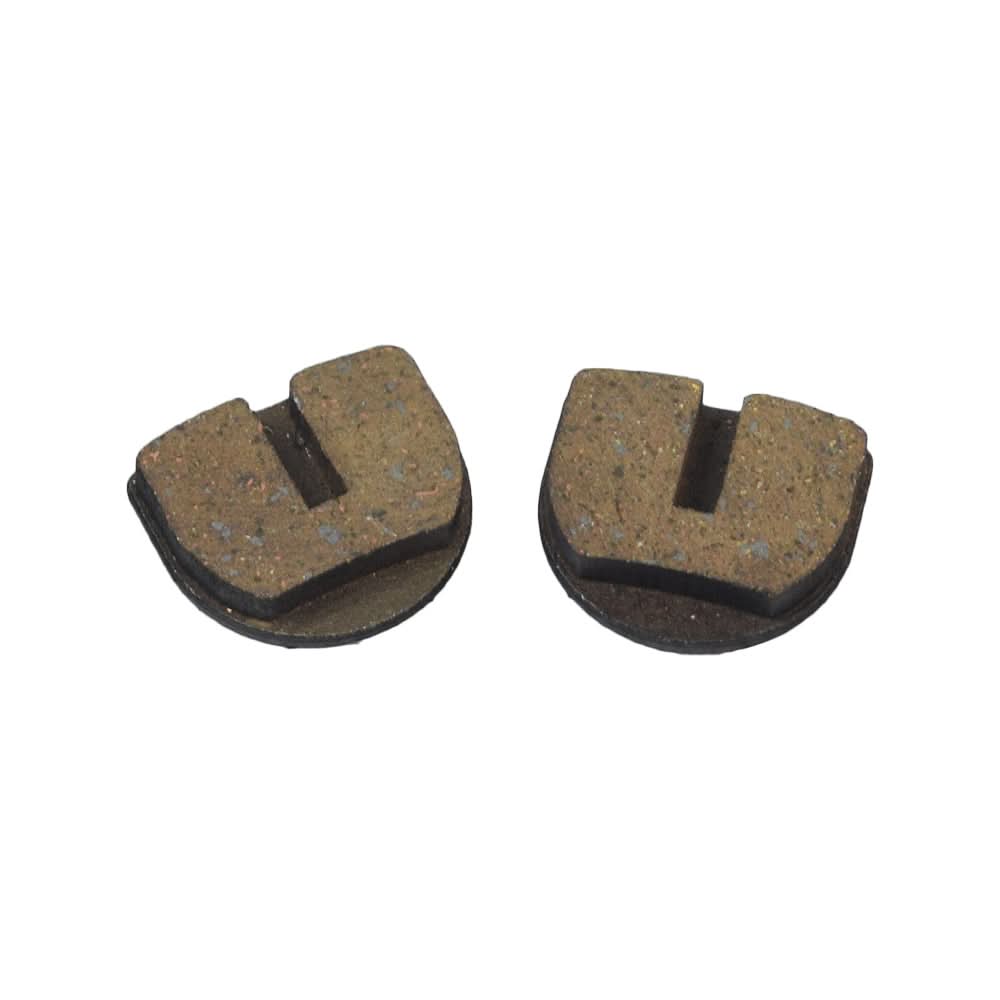 Rounded Brake Pads for Standard & YK2 Flame Calipers (Set of 2) shown in close-up, highlighting their durable sintered design with embedded copper flecks for enhanced longevity and wet performance, suitable for DIY electric dirt bike repairs.