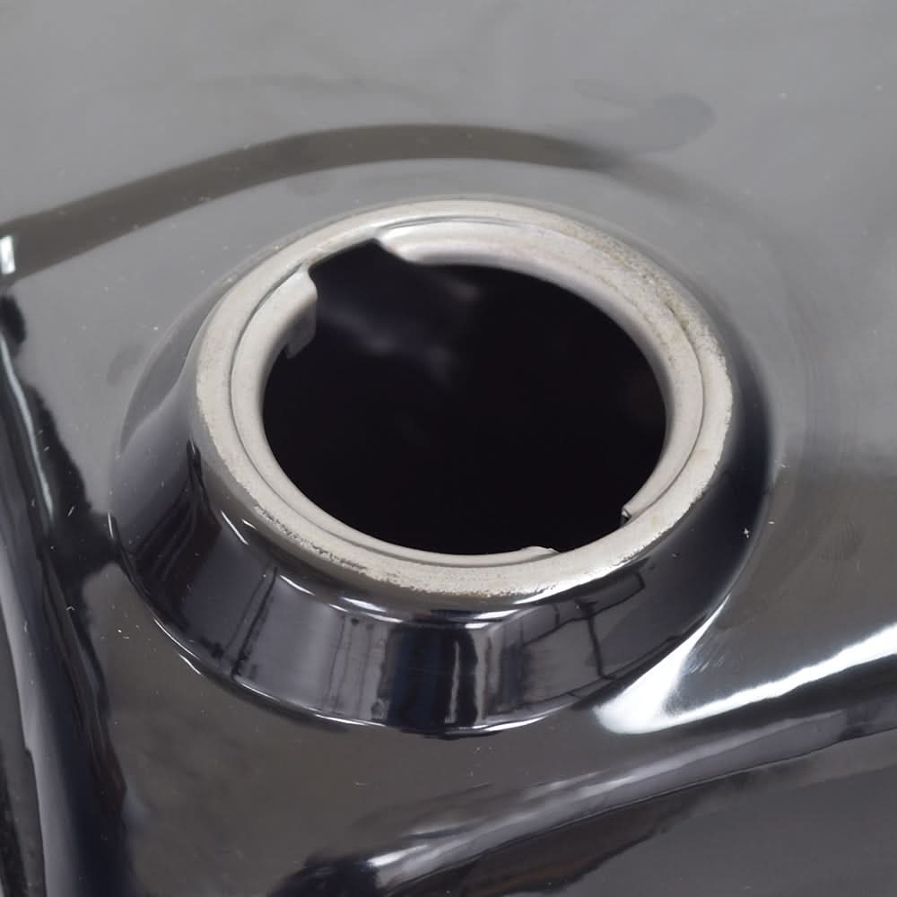 Fuel Tank for the Coleman BT200X, CT200U Trail, & CT200U-EX Mini Bikes (Blemished) featuring a black metal container with a hole, designed for mini bikes and custom projects. Includes steel tank, fill strainer, and cap.
