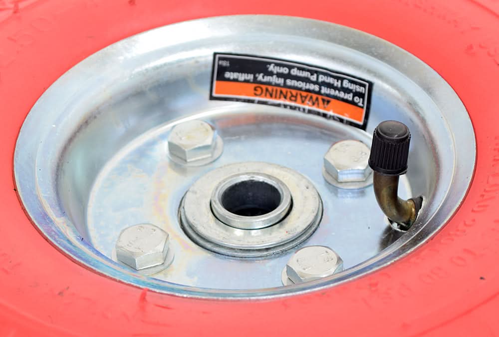 Close-up of an 8 Utility Wheel with Pneumatic Non-Marring Tire & Steel Hub, showing the durable zinc-plated hub and double 5/8 bearing race designed for indoor utility carts and wagons.