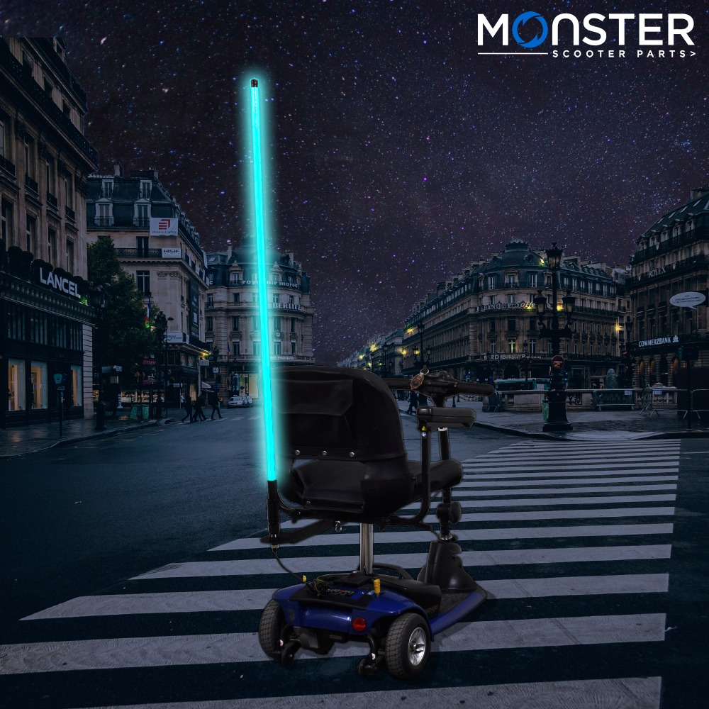 48 Multicolor LED Whip Light & Utility Cart Hitch Extender Kit for Mobility Scooters, showcasing a blue electric wheelchair equipped with a glowing LED light, highlighting its dynamic modes and utility hitch extender.