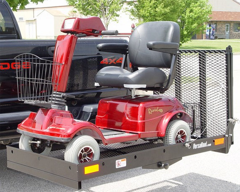 X-Large Mobility Scooter Carrier mounted on a trailer, featuring a wide ramp and large tray designed to transport heavy mobility scooters safely.