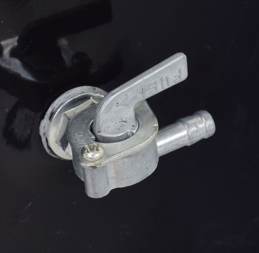 Close-up of Fuel Gas Tank for 150cc - 250cc Hammerhead Off-Road® & Kandi Go-Karts (Blemished), showing the metal tank with a visible fuel valve and a screwdriver nearby.