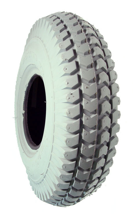 10x3 (3.00-4, 260X85) Knobby Pneumatic Mobility Tire, a white tire with a black hub and knobby tread pattern, designed for rear use on mobility scooters and power chairs. Tube sold separately.