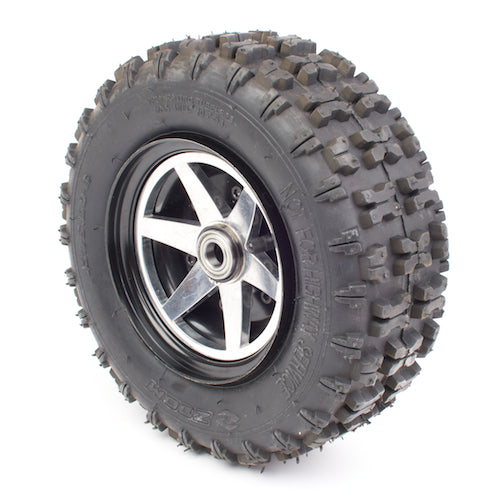 13x5.00-6 Minimoto Jeep Dune Buggy Front Wheel Assembly, featuring a tubeless tire and silver rim, designed for the front wheel with a distinct assembly different from the rear.