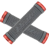 A pair of 130 mm Lock-On Peaty Grips for Bikes & Scooters with visible red lettering on the handlebars, designed for secure, slip-free installation inspired by Steve Peat.