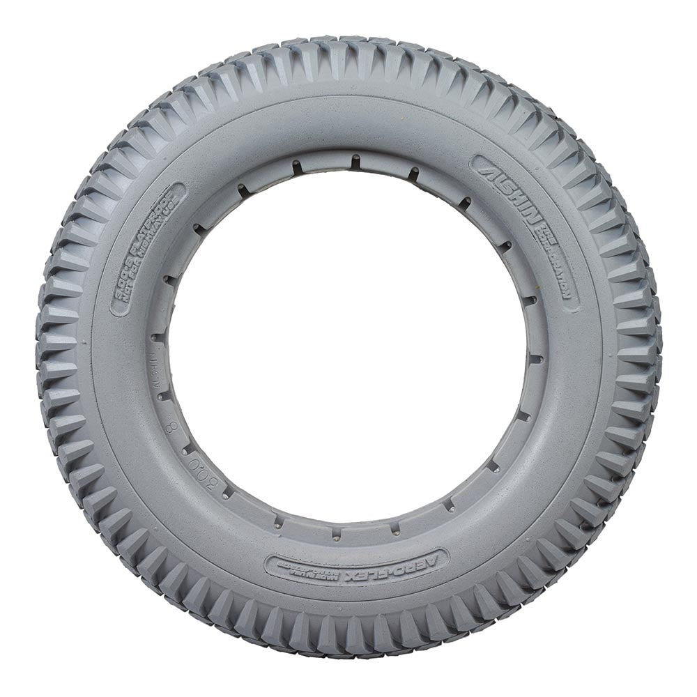 14x3 (3.00-8) Light Gray Solid Urethane Mobility Tire with Aero-flex™ Knobby Tread for Invacare Power Chairs; close-up view highlighting the tire's knobby tread pattern and solid structure.