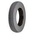 Close-up of the 14x3 (3.00-8) Foam-Filled Mobility Tire with C248 Powertrax Tread, showcasing its knobby pattern and solid insert for flat-free performance.