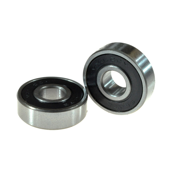 Close-up of two 1605-RS sealed mobility scooter and power chair wheel bearings, highlighting their precise 5/16 x 29/32 size, suitable for caster wheel assemblies in electric power chairs.