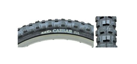 Close-up of the 20x1.75 Black Caesar CST1244 Bicycle Tire, showcasing its deep, aggressive knobs ideal for BMX traction on dirt or street.