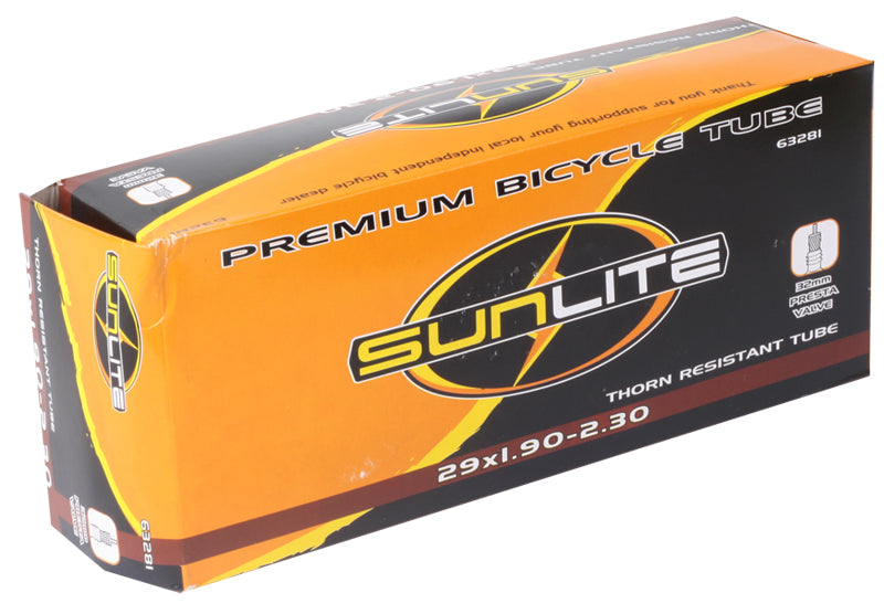 Box displaying the 29x1.90-2.30 Heavy Duty Thorn Resistant Bicycle Inner Tube with 32mm Presta Valve from Sunlite, known for enhanced durability and puncture resistance.