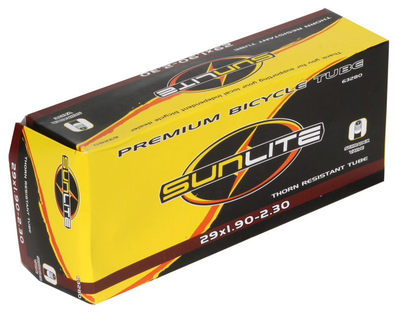 Yellow and black box labeled 29x1.90-2.30 Heavy Duty Thorn Resistant Inner Tube with Straight Schrader Valve by Sunlite, suitable for bicycle tire replacement.