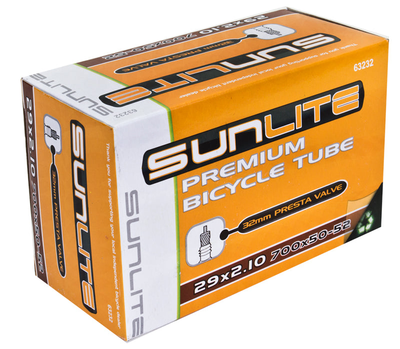 Box displaying a 29x2.10 Bicycle Inner Tube with 32mm Presta Valve from Sunlite, ideal for replacing old bike tubes.