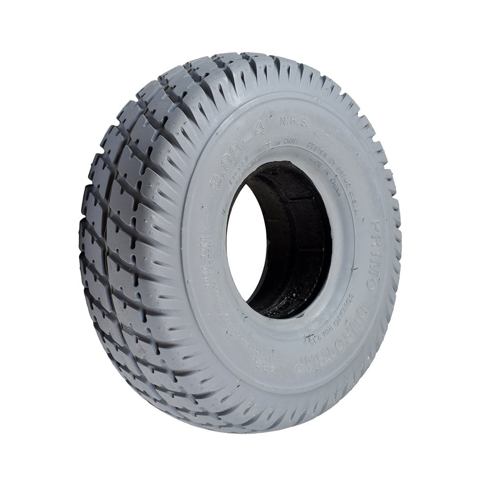 Close-up of a 3.00-4 (10x3, 260X85) Standard Foam-Filled Mobility Tire (Flush Profile; 2-3/4 Bead Width) with Durotrap C9210 Tread (Primo), showcasing the durable tread pattern and foam-filled structure.